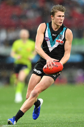 Xavier Duursma is one of a number of young Port Adelaide players who have missed a chunk of the 2021 AFL campaign through injury, and is one of three to return this evening for the game against Collingwood. In their absence Port Adelaide has drifted out of premiership calculations with a string of unimpressive performances, but a loss to Brisbane last week sees them back in the top four and with a chance to prove that they belong there. Their surge over the past year or two came with the advent of tyros like Duursma, and perhaps that's the key to their flag hopes.