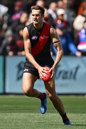 Zach Reid has been the archetypal boy with the barrow this season, with the job in front of him. Essendon is somewhere near rock bottom, having sacked its coach and continuing to lose matches by big margins most weeks. Reid has lost the services of Ben McKay in defence recently, leaving him even more isolated on the opposition's best key forward, facing more supply than the Colombian drug cartels. It is hard to tell if he's any good under such trying circumstances, and you can tell by the look on his face that he's not having much fun. Chin up, lad!